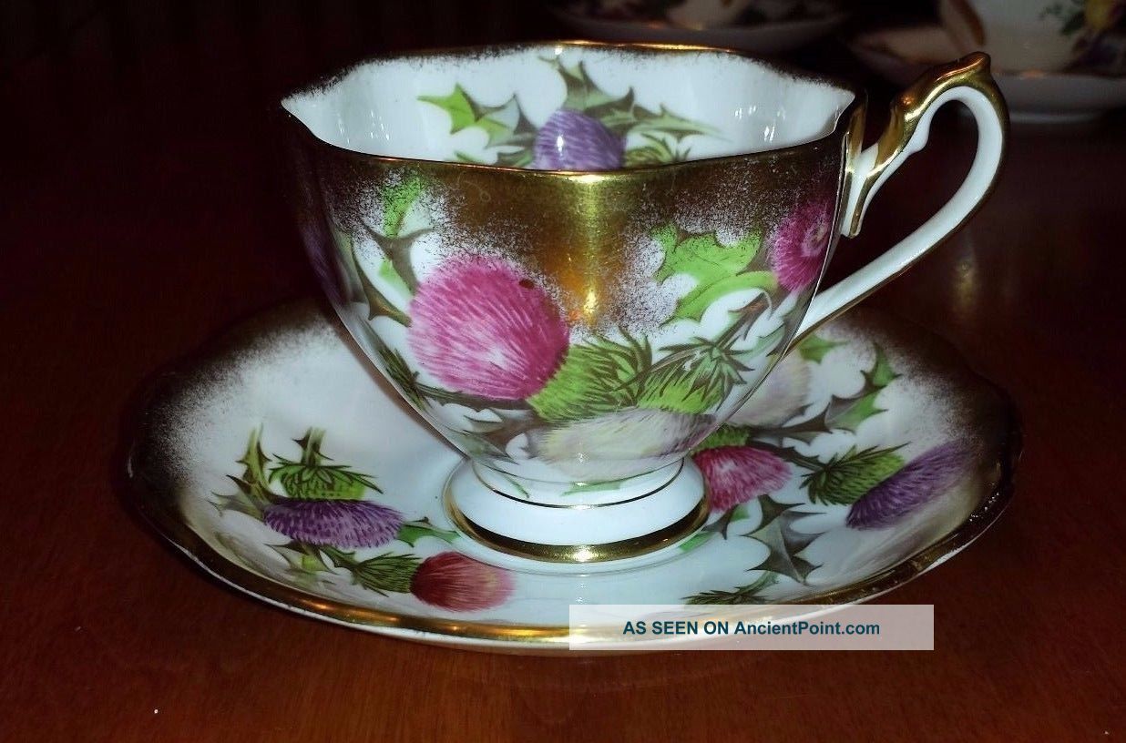 Queen Anne Gold Guilded Thistle Tea Cup And Saucer Cups & Saucers photo