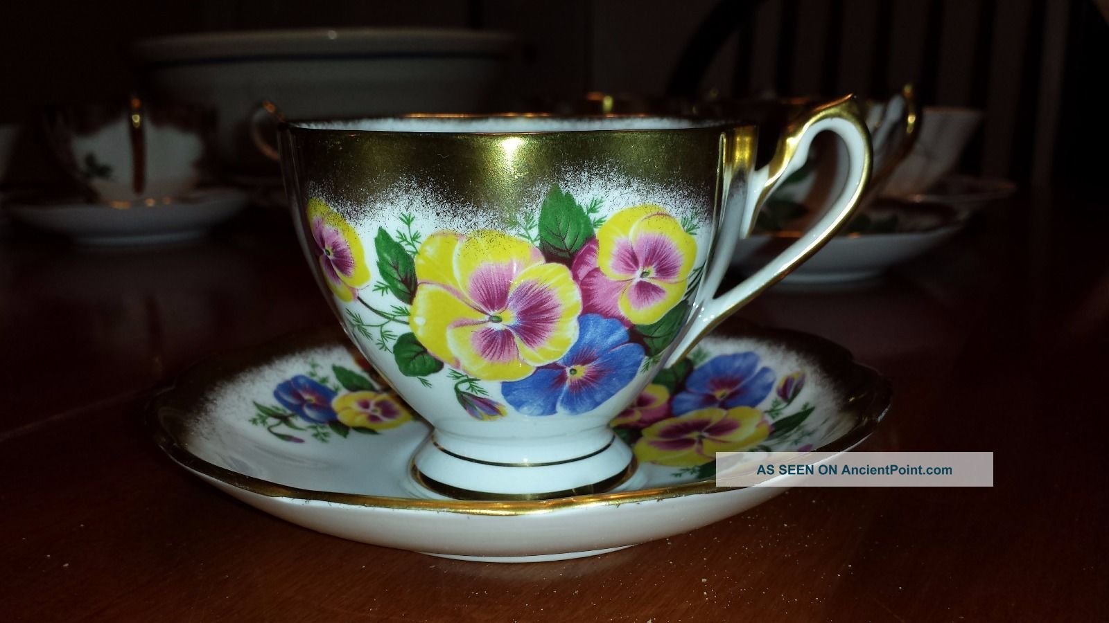 Queen Anne England Pansies And Gold Guilded Tea Cup And Saucer Cups & Saucers photo