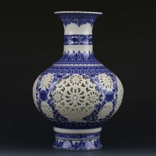 Chinese White & Blue Porcelain Hand Painted & Hollow Carved Vase W Qianlong Mark photo