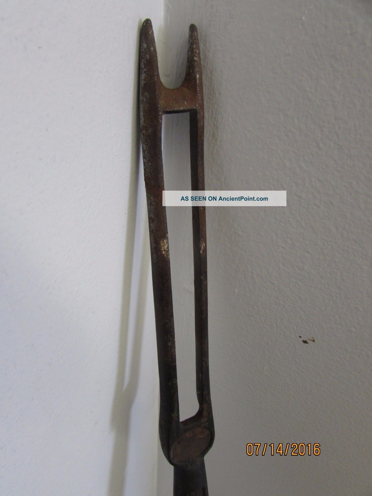 antique dandelion puller