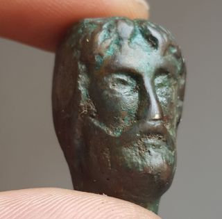 Ancient Bronze Roman Head Statue photo