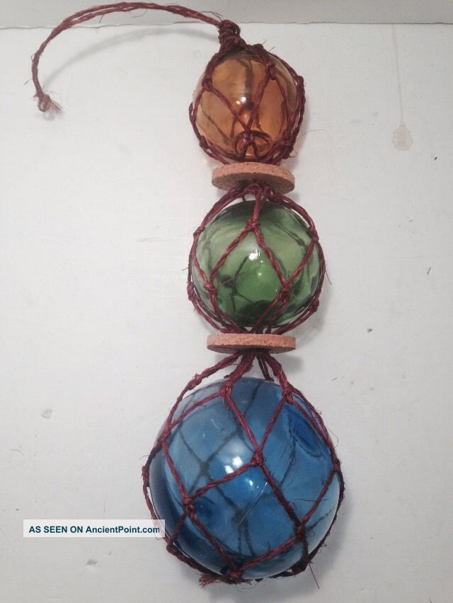 3 Hand Blown Glass Fishing Floats Netted 11.  5 