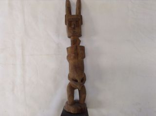 Very Old Sculpture On Stand Africa photo