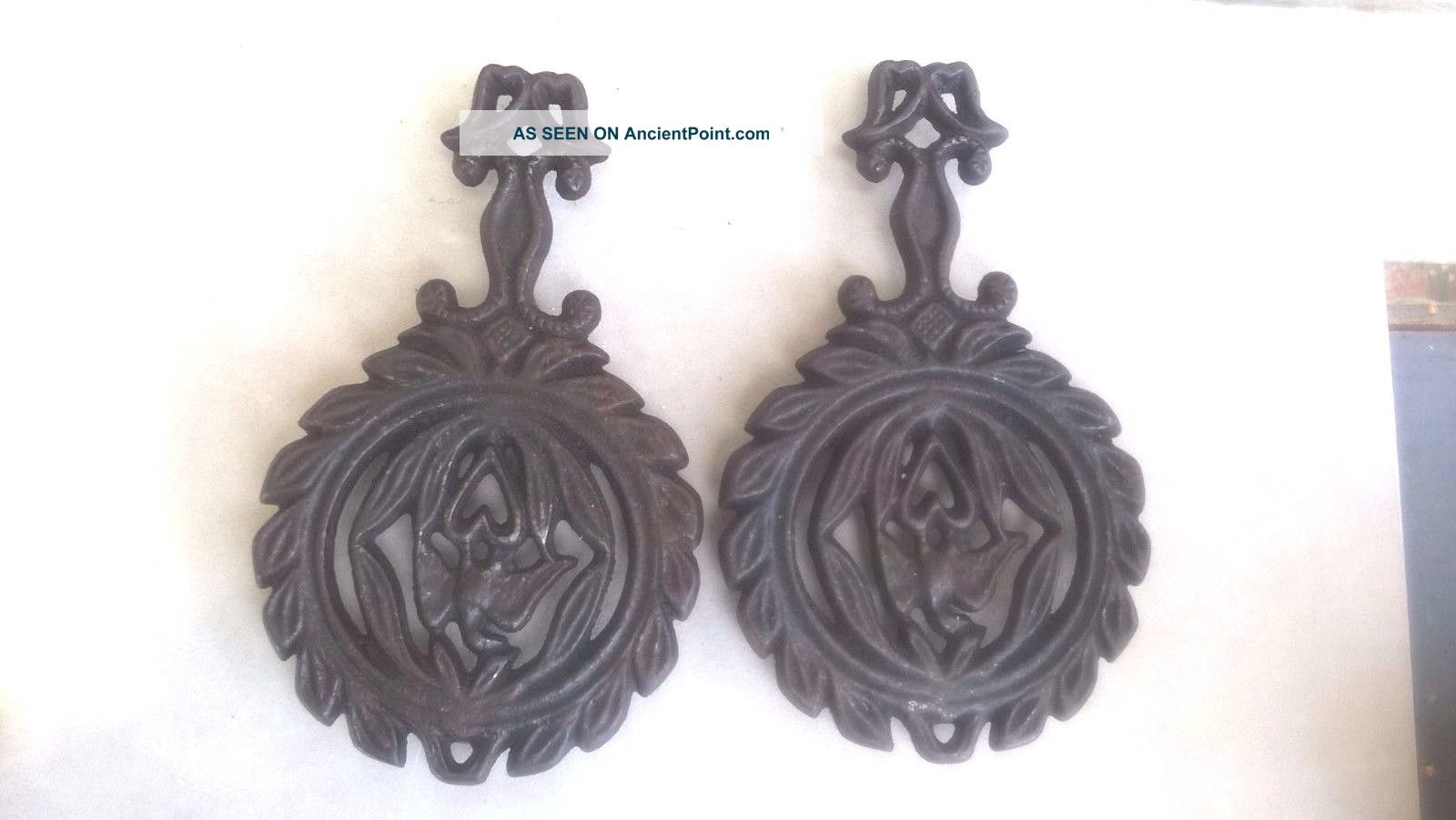 Two Antique Griswold Cast Iron 1736 Trivets Eagle And Heart Trivets photo
