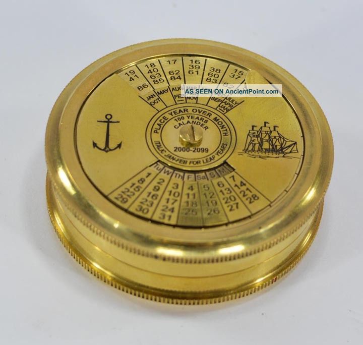 Antique Vintage Maritime Brass 100 Years Calender Pocket Compass Reproduction See more Antique Vintage Maritime Brass 100 Years Calen... photo