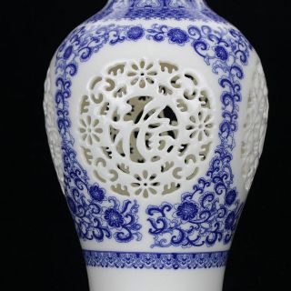 Chinese White & Blue Porcelain Painted & Hollow Carved Vase W Qianlong Mark photo