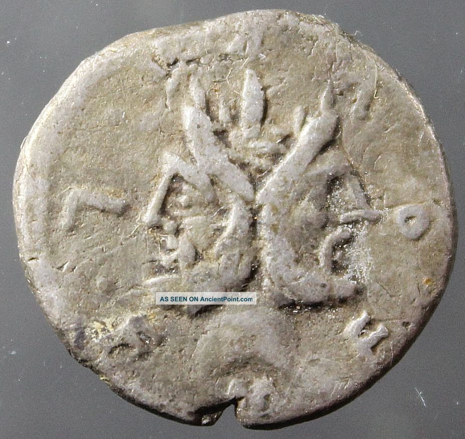L Furius Philus,  Silver Denarius,  Janus Head,  Trophy,  Minted Rome Ca.  121 Bc Roman photo