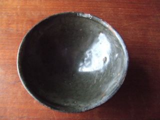 China.  Sung Dynasty.  12th/13th C.  Dark Green Glazed Pottery Tea Bowl, photo