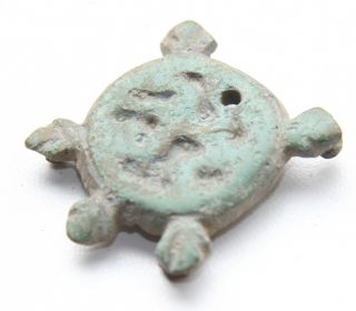 Ancient Old Zoomorphic Bronze Ornament photo