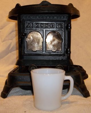 Antique Economist 1884 Miniature Cast Iron Kerosene Heater Stove Perry & Co. photo