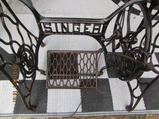 Antique Singer Treadle Sewing Machine Cast Iron Base With Rollers photo