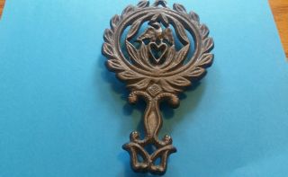 One Antique Griswold Cast Iron 1736 Trivet Eagle And Heart photo