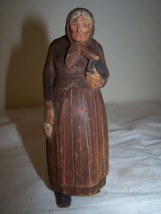 Swiss Wooden Carved Painted Woman Carrying Bible And Holding Handkerchief photo